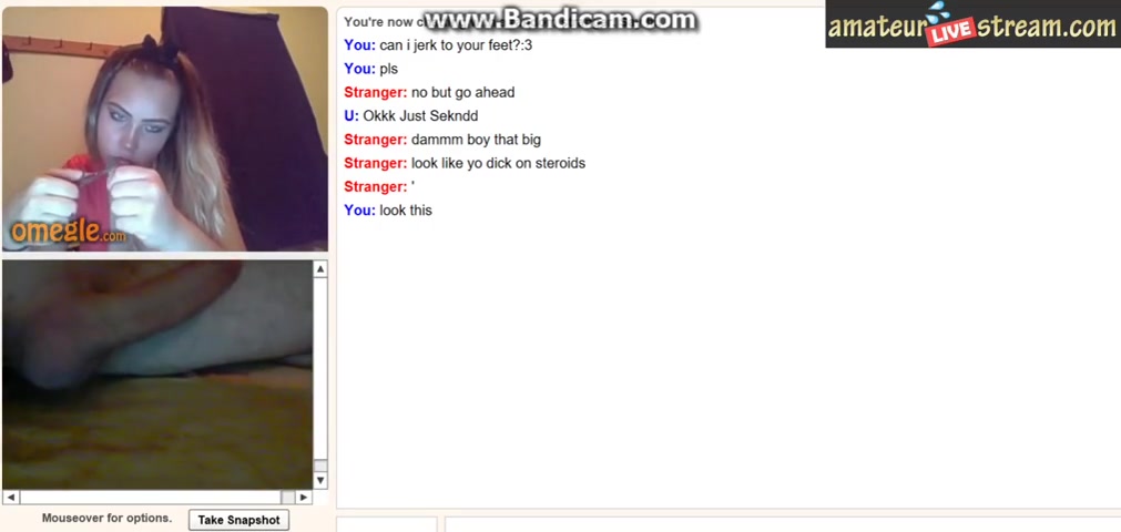 Stone faced blonde watching guy jerking